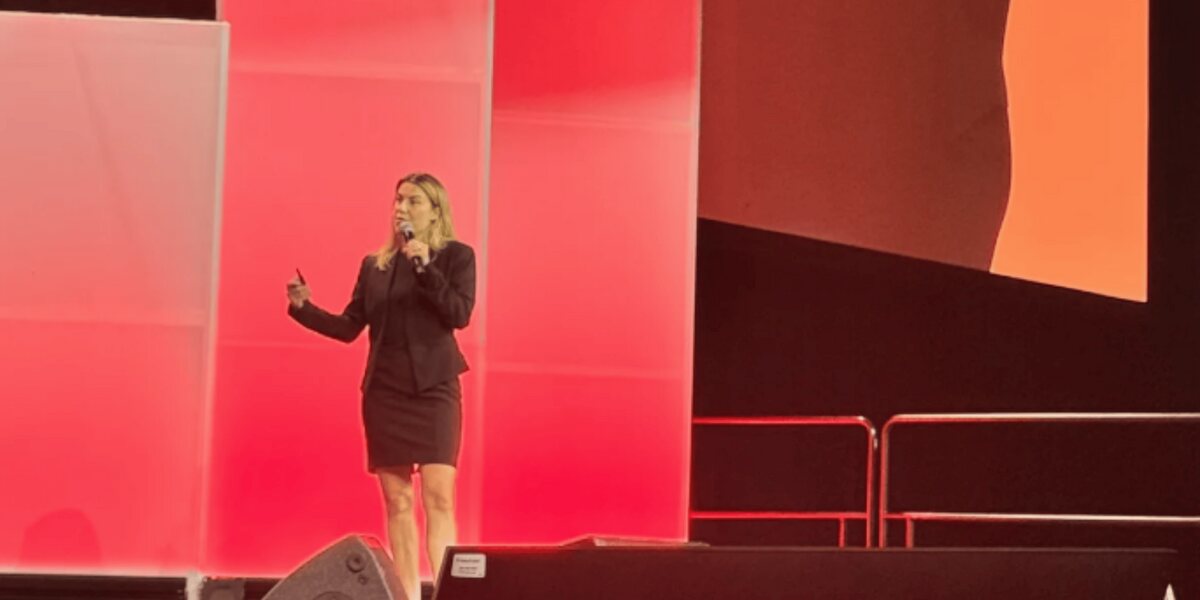 Georgia Myers of Flow Health Science presenting on stage at the ADA Scientific Sessions 2026