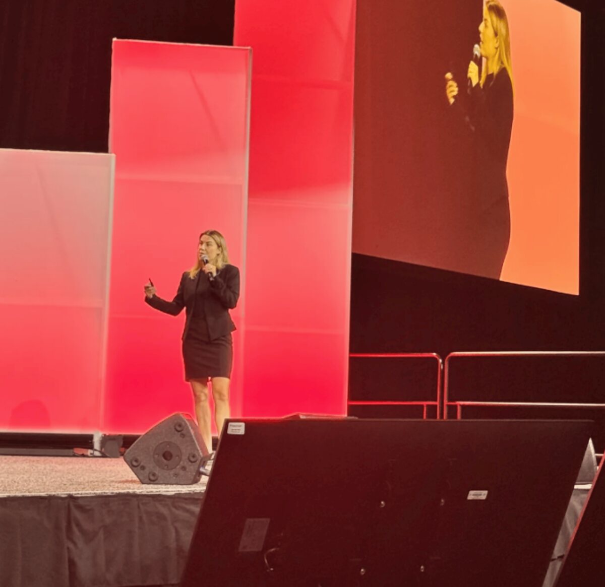 Georgia Myers of Flow Health Science presenting on stage at the ADA Scientific Sessions 2026